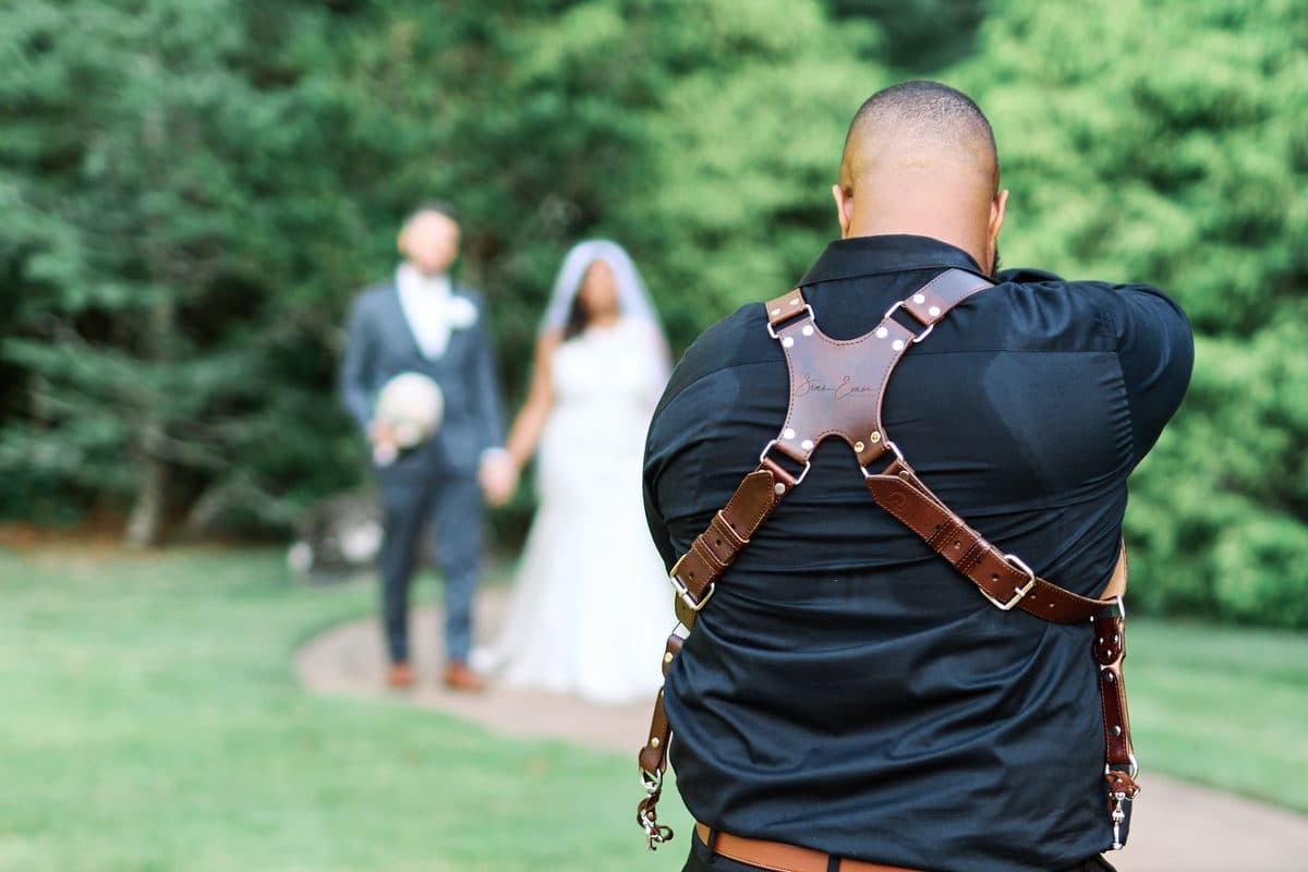 Sean Evans photographing a wedding couple